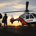 UT LIFESTAR aeromedical helicopter on helipad at sunrise